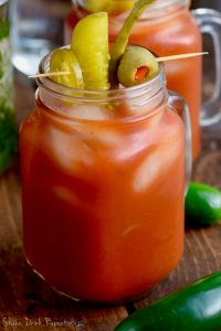 This Jalapeño Bloody Mary is the perfect spicy Bloody Mary recipe!  Made with my simple jalapeño infused vodka, it gives you the right kick you need for your Sunday brunch cocktail recipe!
