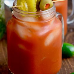 This Jalapeño Bloody Mary is the perfect spicy Bloody Mary recipe!  Made with my simple jalapeño infused vodka, it gives you the right kick you need for your Sunday brunch cocktail recipe!