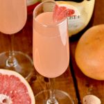The ingredients for this champagne cocktail are vodka, juice, and champagne! So easy!