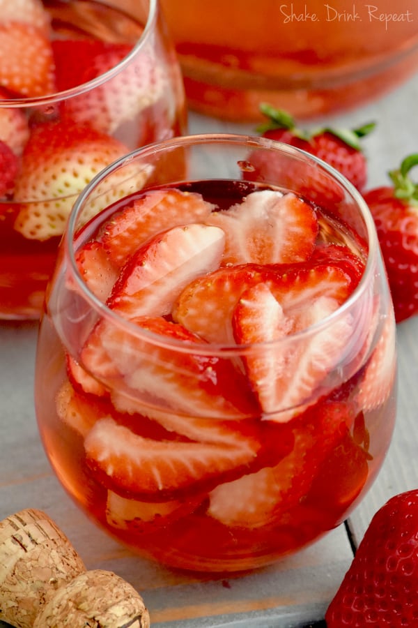 This Rose Sangria recipe with vodka is the perfect easy drink for a party or get together. This easy cocktail recipe comes together fast! If you love sparkling rose, you will love this drink!