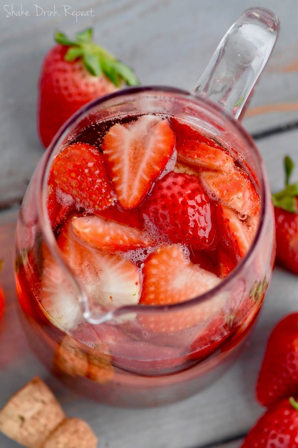 This Rose Sangria recipe with vodka is the perfect easy drink for a party or get together. This strawberry rose sangria recipe is great to make for a party!