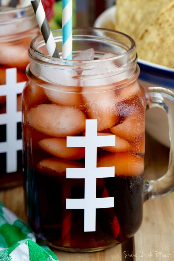 This Super Bowl Slammer Drink Recipe is a great quick way to get a buzz for the big game!  It is one of the best tailgating drinks because it is easy to make and full of fun flavor combinations.