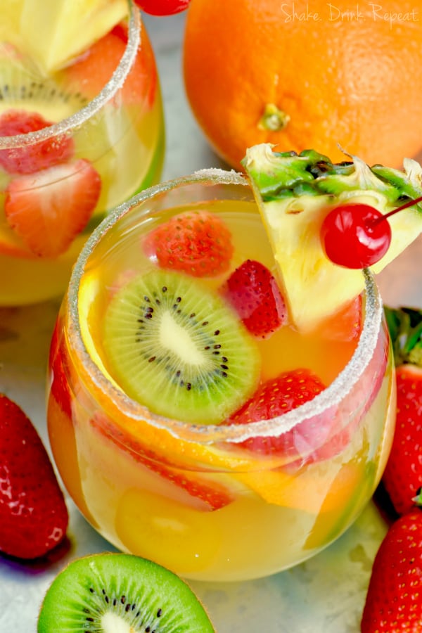 This Tropical Margarita Sangria is full of tequila, wine, and delicious fruit!