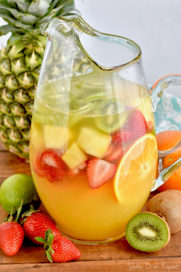 This Tropical Margarita Sangria recipe is easy and made with white wine and tequila!