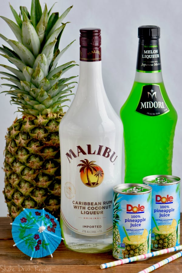 This Midori Splice cocktail is the perfect tropical drink made with just four ingredients!