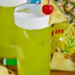 This Midori Splice cocktail is the perfect tropical drink made with just four ingredients!