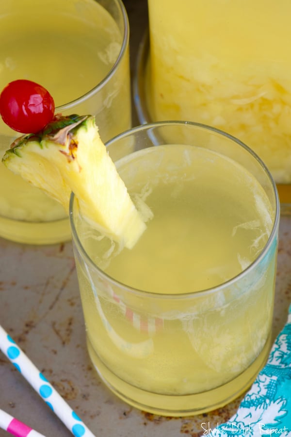 This easy Pina Colada Sangria Recipe comes together with only three ingredients! It is the perfect party drink! Make a double batch because it is that good!