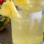 This easy Pina Colada Sangria Recipe comes together with only three ingredients! It is the perfect party drink! Make a double batch because it is that good!