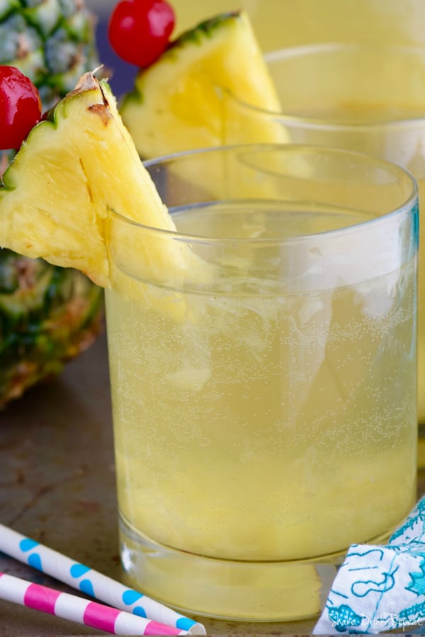 This easy Pina Colada Sangria Recipe comes together with only three ingredients! It is the perfect party drink! Make a double batch because it is that good!