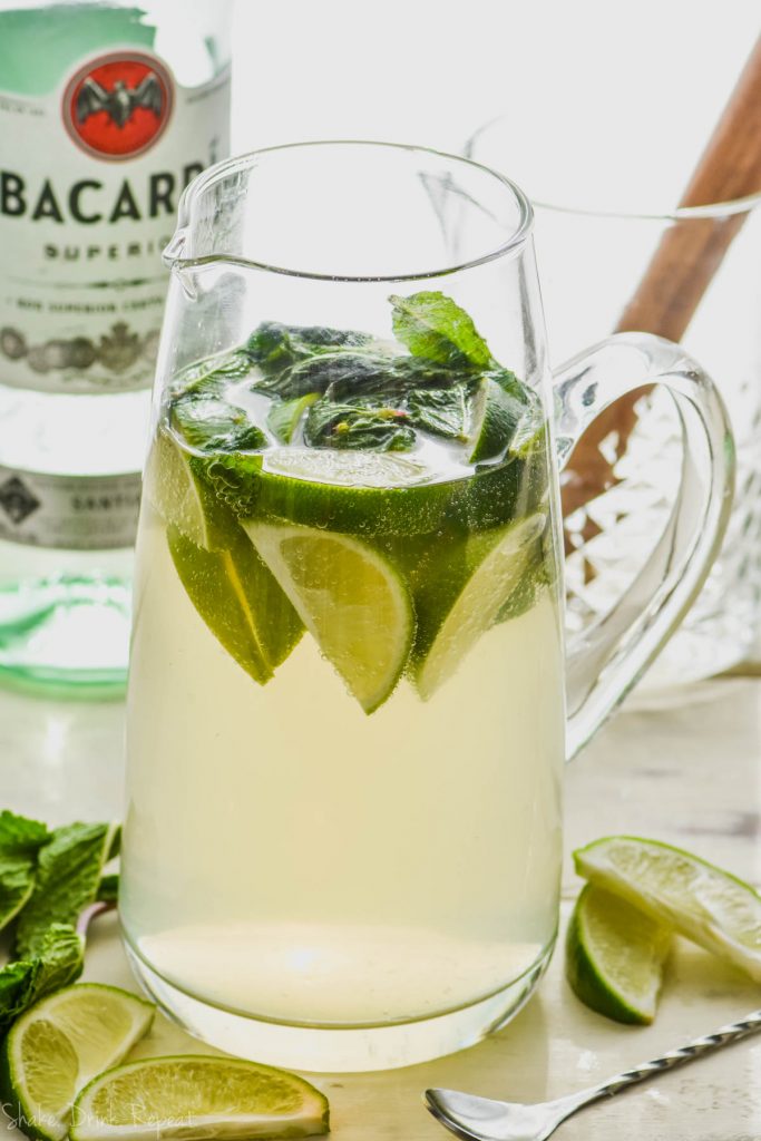 pitcher of mojito sangria recipe with limes and mint