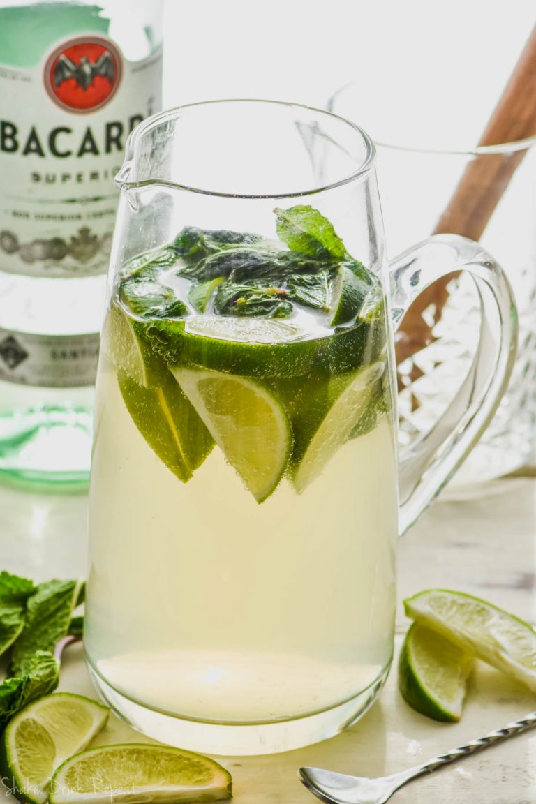 pitcher of mojito sangria recipe with limes and mint