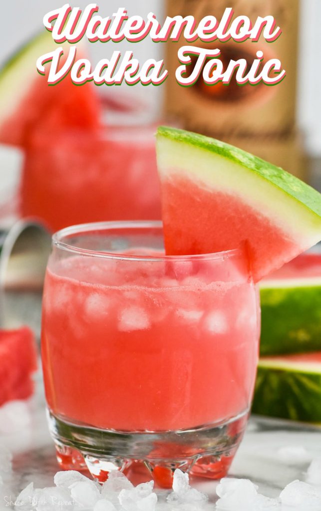 glass of watermelon vodka tonic garnished with a watermelon wedge