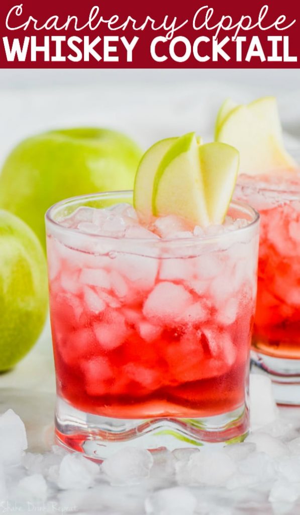 cranberry apple whiskey cocktail garnished with apple