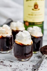irish coffee shots topped with whipped cream