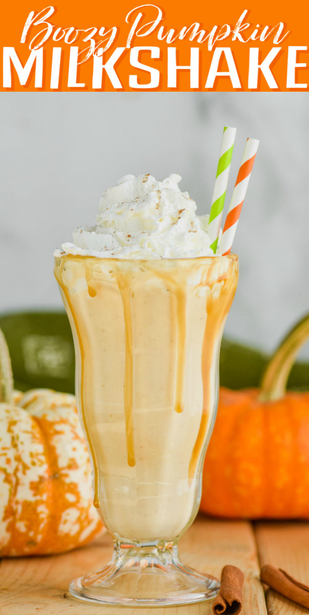 boozy pumpkin milkshake with whipped cream and straws