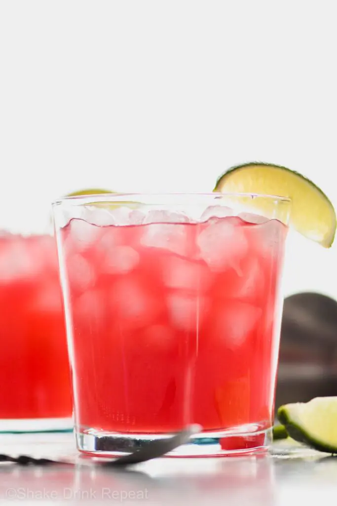 Picture of Two Sea Breeze Drinks in a glass garnished with a lime