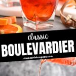 two glasses of boulevardier with ice and orange garnish