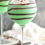 Grasshopper drink in glass with whipped cream and chocolate