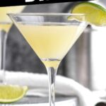 Kamikaze drink in martini glass with lime wedge garnish