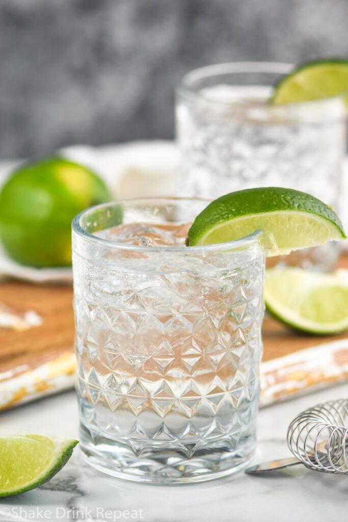 two glasses vodka tonic with lime wedge