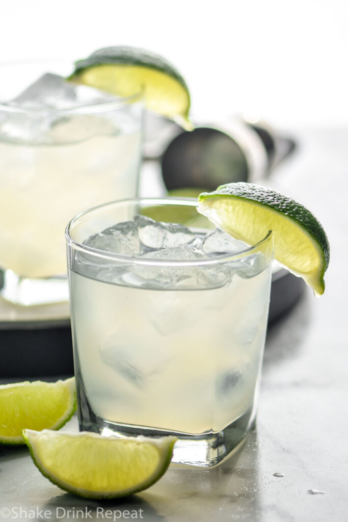 Two glasses of vodka Gimlet with ice and limes