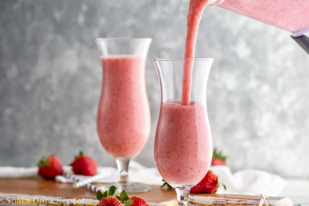 two glasses of blended strawberry colada recipe