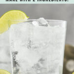 glass of vodka soda with ice and lime