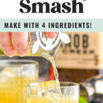 making a whiskey smash and pouring into a glass with ice and fresh mint