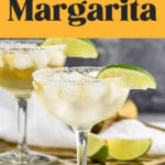 two glasses of Cadillac Margarita with ice, salted rim, and lime wedge garnish