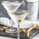 two glasses of Vodka Martini with olives as garnish
