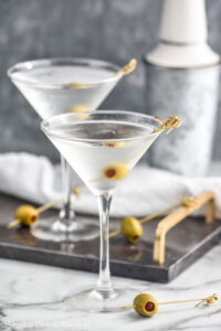 two glasses of Vodka Martini with olives as garnish