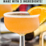 Sidecar cocktail with sugared rim and orange slice garnish