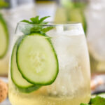 glass of Lillet Spritz with fresh mint leaves and cucumber slices