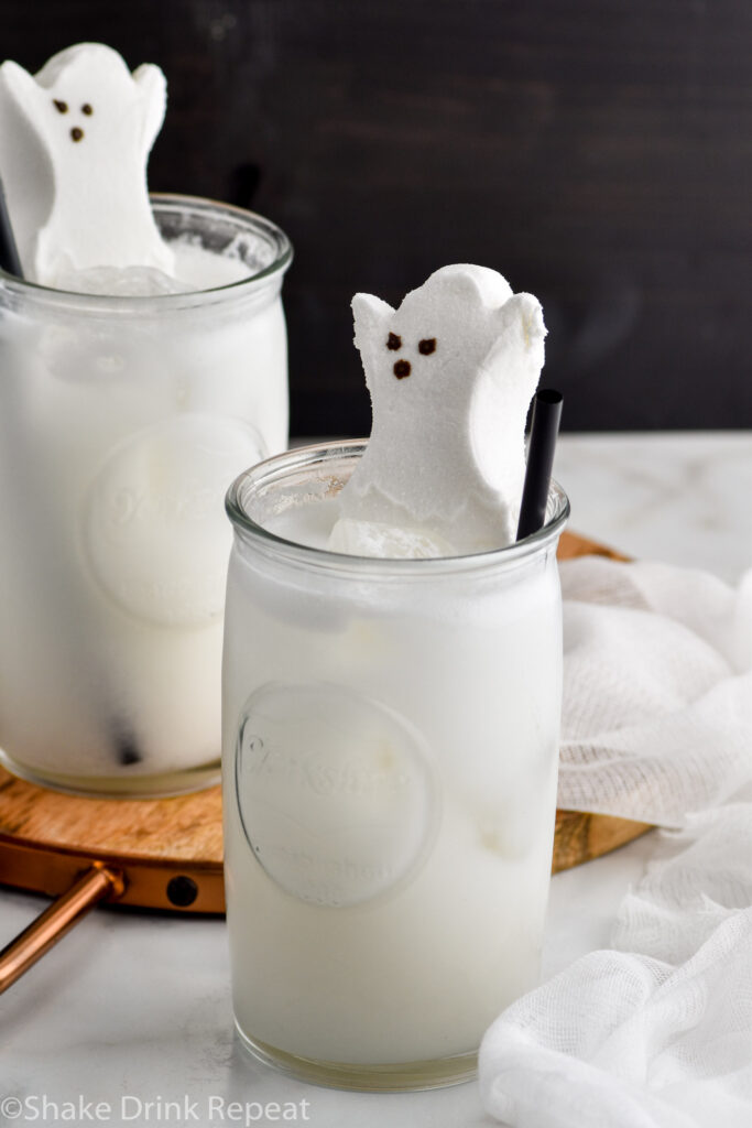 two glasses of Drunk Ghost with straws and garnished with a Ghost Peep