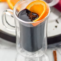 glass mug of Mulled Wine recipe with orange slice and clove