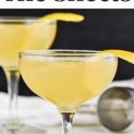 two coupe glasses of Between the Sheets cocktail recipe with lemon peel garnish