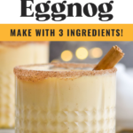 glass of Fireball Eggnog recipe rimmed with cinnamon sugar and garnished with cinnamon sticks