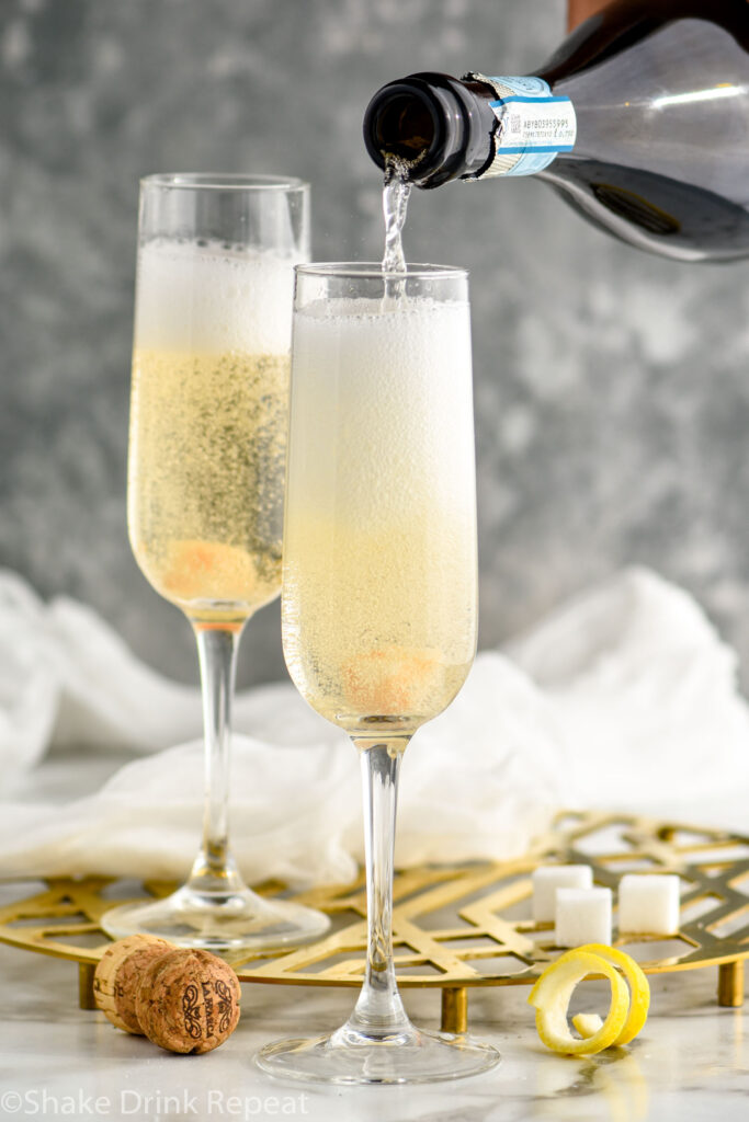 champagne being poured into a champagne flute