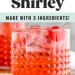 Two glasses of Dirty Shirley drinks with ice and maraschino cherries