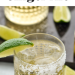 Glass of Tequila and Ginger Ale with ice, salted rim and wedge of lime for garnish