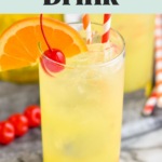 Glass of Yellow Bird Drink recipe with ice and two straws, garnished with a cherry and orange slice