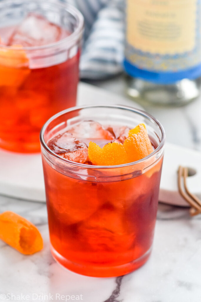 An earthy twist on a classic cocktail, this Mezcal Negroni recipe will surprise your tastebuds in the best way. Made with only three ingredients, this simple, refreshing cocktail will become a staple of your bar cart.