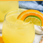 Pinterest graphic for Texas Margarita recipe. Text says, "So easy! Texas margarita make with 4 ingredients shakedrinkrepeat.com" Image is photo of texas margarita served over ice and garnished with lime and orange wedges.
