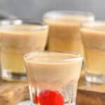 four shot glasses of slippery nipple shots