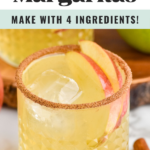 pinterest graphic of Apple cider margaritas text says "apple cider margaritas so easy! Make with 4 ingredients! shakedrinkrepeat.com" Image shows glass of apple cider margarita with ice, apple slices, and cinnamon sugar rim.