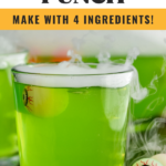 Pinterest graphic of Halloween Punch. Text says "Halloween Punch so easy! Make with 4 ingredients! shakedrinkrepeat.com" Image shows glass of Halloween punch with dry ice and toy eye balls