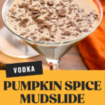pinterest graphic of Pumpkin Spice Mudslide. Text says "vodka Pumpkin Spice Mudslide shakedrinkrepeat.com" Image shows a martini glass of pumpkin spice mudslide topped with chocolate shavings. Cinnamon sticks lay beside glass.