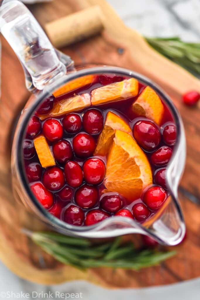 overhead of a pitcher of cranberry orange sangria