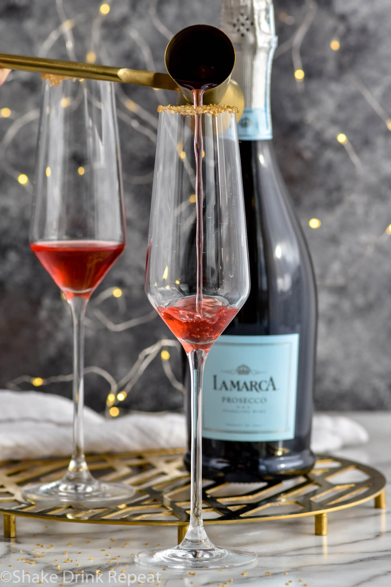 Meet Me at Midnight Champagne Cocktail Shake Drink Repeat