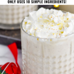 Pinterest photo of Spiked Eggnog with a glass of eggnog with whipped cream. Says 'the best spiked eggnog only uses 10 simple ingredients, shakedrinkrepeat.com'